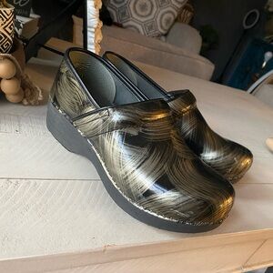 Dansko Black and Gold Swirl Clogs